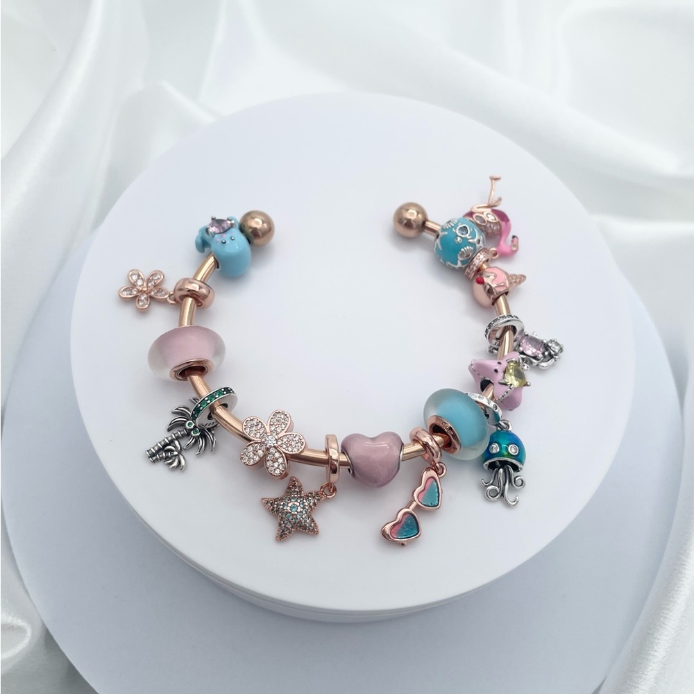 Linx Stainless Rose Gold Open Bangle with Pink and Blue Beach Themed Charms